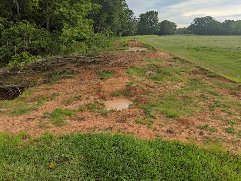 water shows on a breach in the south side of the Perry County Levee