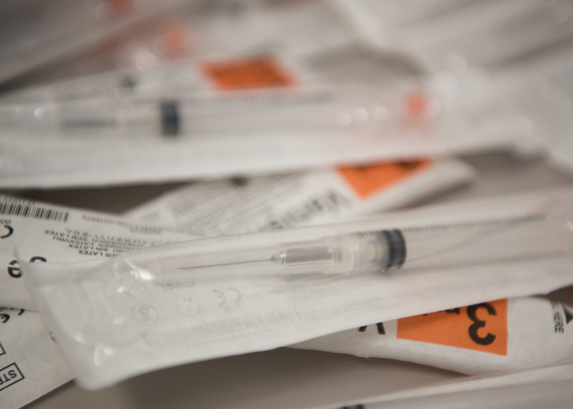 Needles sit in a drawer in the immunizations clinic at the 509th Medical Group.