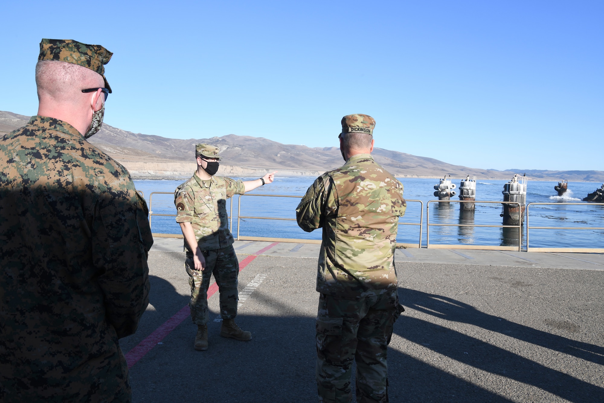 U.S. Army Gen. James H. Dickinson, United States Space Command commander, and U.S. Marine Corps Master Gunnery Sgt. Scott Stalker, USSPACECOM command senior enlisted leader, are briefed by Tech. Sgt. Anthony Touchette, 2nd Space Launch Squadron mission assurance technician supervisor, about the Space Launch Complex 6 Sea Port Nov. 16, 2020, at Vandenberg Air Force Base, Calif.