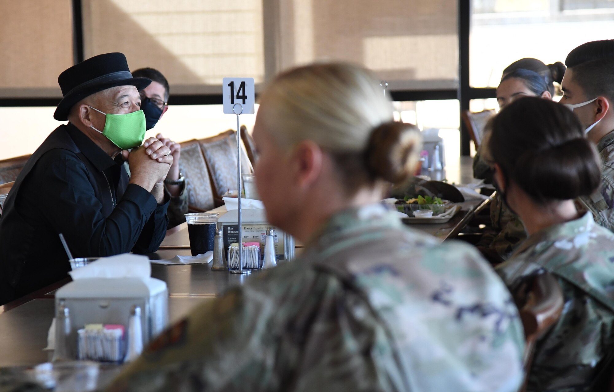 GrayHawk Perkins speaks with Keesler leadership and personnel during lunch inside the Bay Breeze Event Center at Keesler Air Force Base, Mississippi, Nov. 19, 2020. Perkins visited Keesler to share his story about his life growing up as a Native American in celebration of Native American History Month. (U.S. Air Force photo by Kemberly Groue)