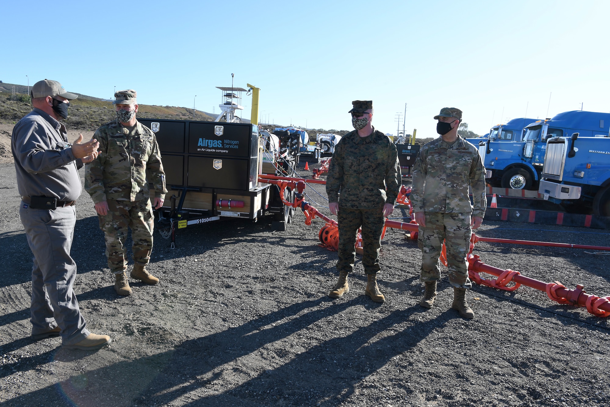 United States Space Command leadership and base leadership receive a briefing at the Gaseous Nitrogen pumper truck area Nov. 16, 2020, at Vandenberg Air Force Base, Calif.