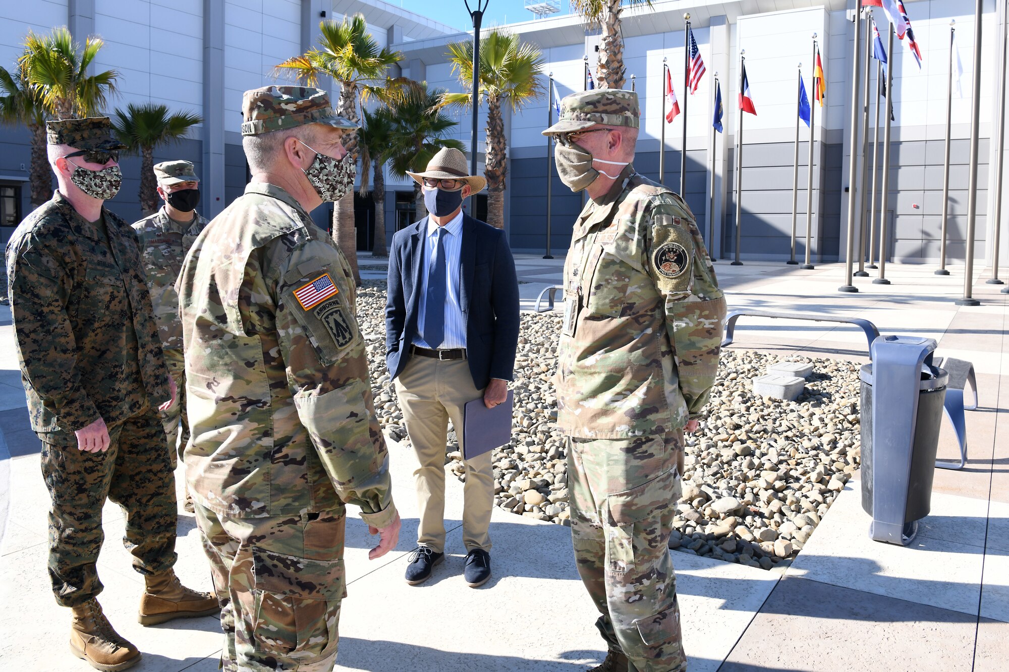 U.S. Army Gen. James H. Dickinson, United States Space Command commander, “coins” Lt. Col. Kevin Tobias, Combined Space Operations Center consolidation director, Nov. 16, 2020, at Vandenberg Air Force Base, Calif.