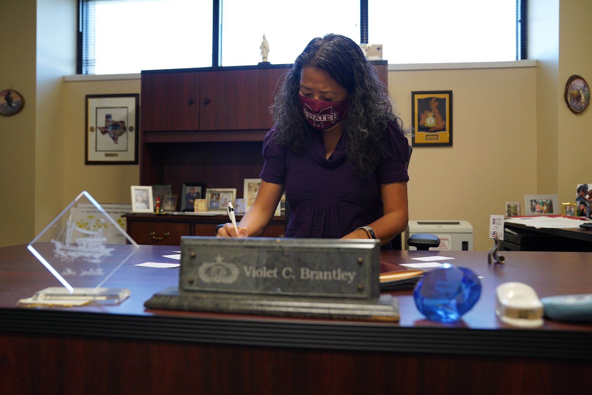 Violet Brantley, 81st Training Group training administrator, writes notes inside Matero Hall at Keesler Air Force Base, Mississippi, Nov. 12, 2020. Keesler recently developed a partnership with Mississippi State University to enhance technological innovation by working together. (U.S. Air Force photo by Airman 1st Class Seth Haddix)