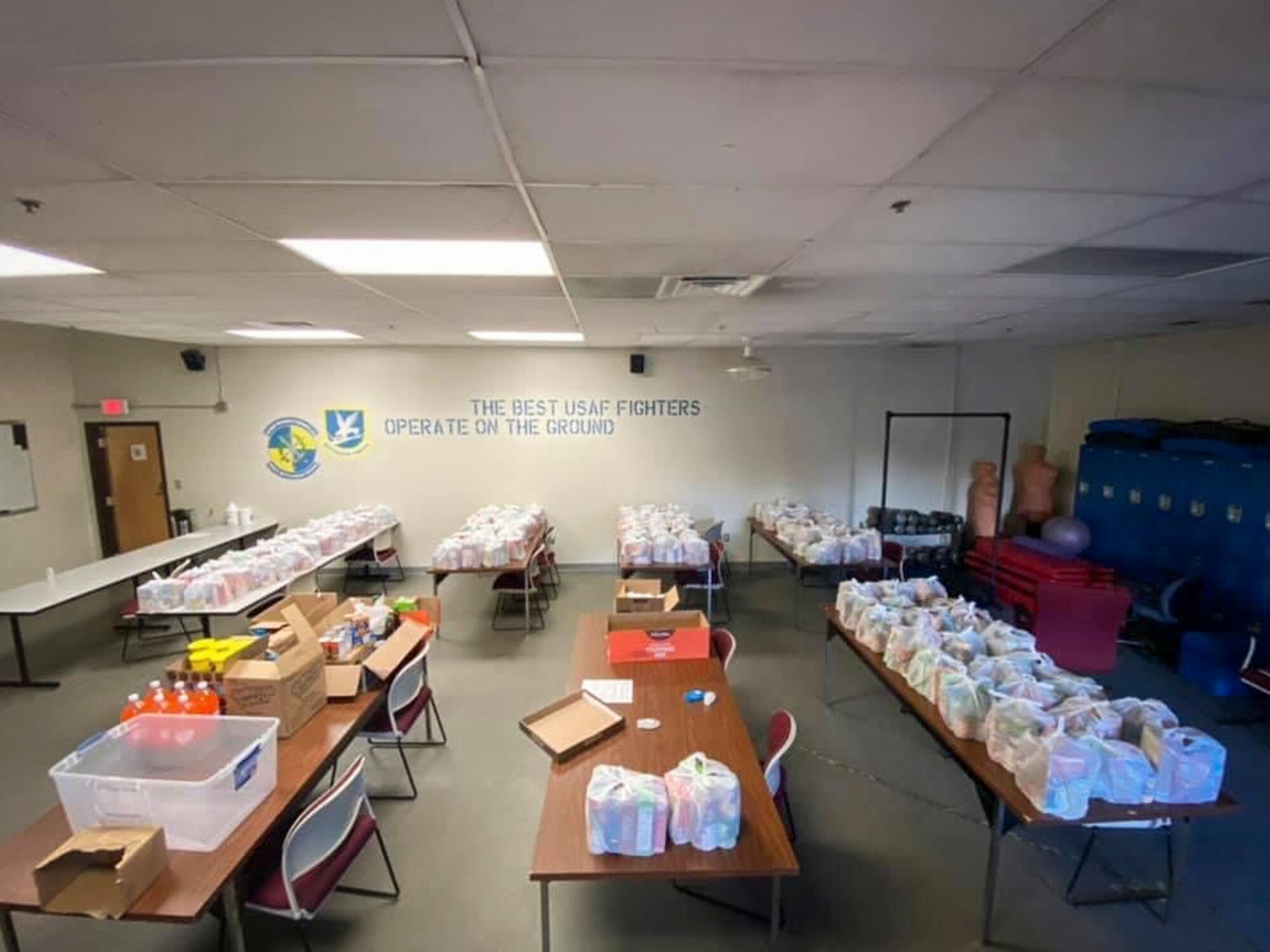Thanksgiving family meal kits are prepared for delivery in the 103rd Security Forces Squadron training classroom at Bradley Air National Guard Base in East Granby, Connecticut, Nov. 16, 2020. Senior Airman Alexis Maher, 103rd Security Forces Squadron defender, organized this year’s squadron Thanksgiving food drive, in which 103rd Airlift Wing members helped donate a total of 120 meal kits to food banks in six Connecticut towns. (Courtesy photo)