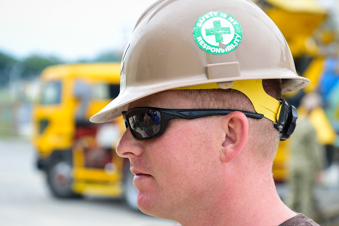 190403-N-TP832-1079 OKINAWA, Japan (April 3, 2019) Steelworker 2nd Class Charles Jeffries, a safety supervisor assigned to Naval Mobile Construction Battalion (NMCB) 3, observes a concrete placement for the construction of a k-span structure onboard Camp Shields in Okinawa, Japan. NMCB-3 is forward deployed throughout the Indo-Pacific region and United States ready to support major combat operations, theater security, humanitarian assistance and disaster relief operations. (U.S. Navy photo by Mass Communication Specialist 2nd Class Michael Lopez/Released)