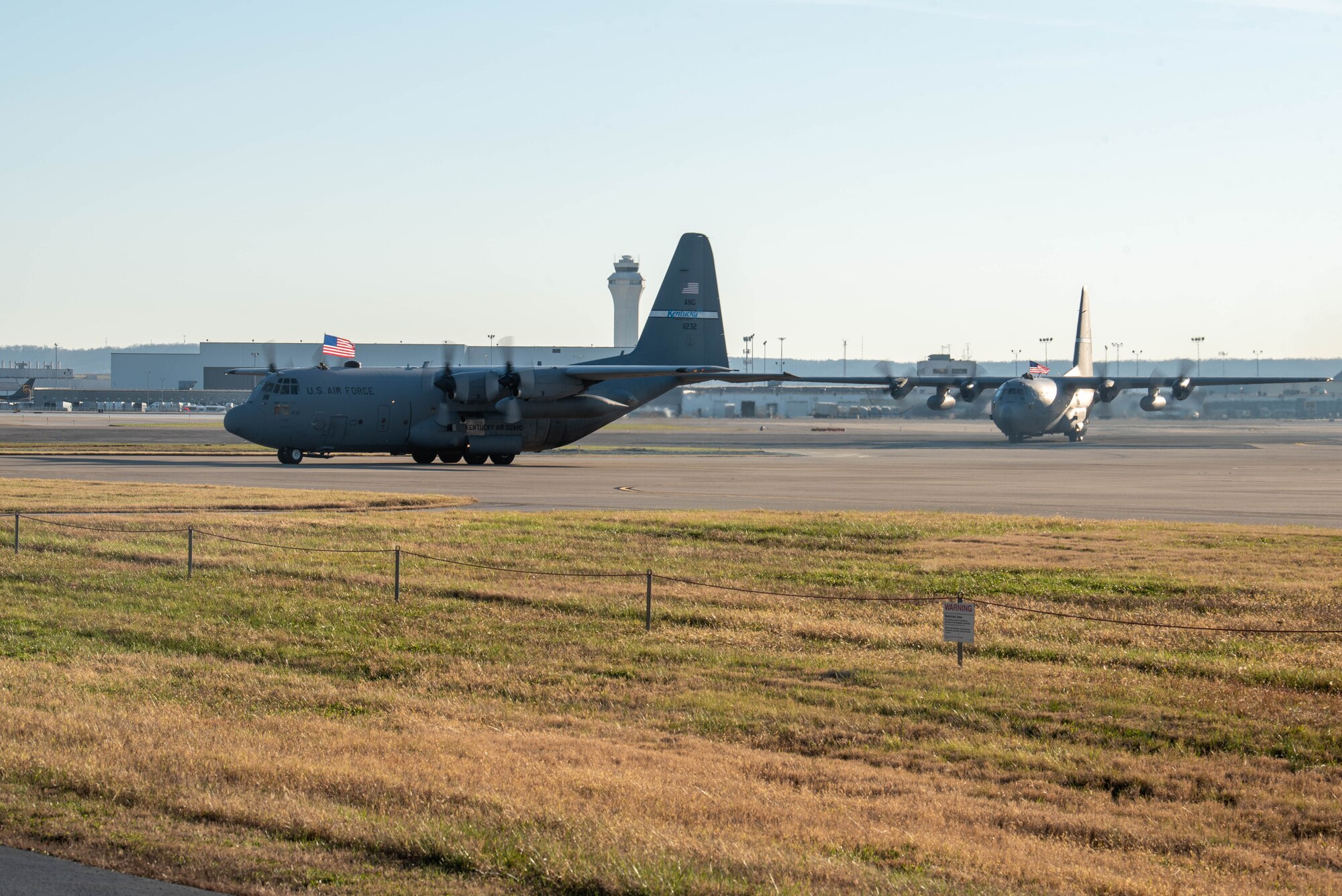 More than 90 Airmen from the Kentucky Air National Guard’s 123rd Airlift Wing return to their home base in Louisville, Ky., on Nov. 18, 2020, after completing a four-month deployment to the Middle East in support of Operations Inherent Resolve and Freedom’s Sentinel. The Airmen, who arrived aboard Kentucky Air Guard C-130 Hercules aircraft, operated from an undisclosed air base while flying troops and cargo across the U.S. Central Command Area of Responsibility. (U.S. Air National Guard photo by Phil Speck)