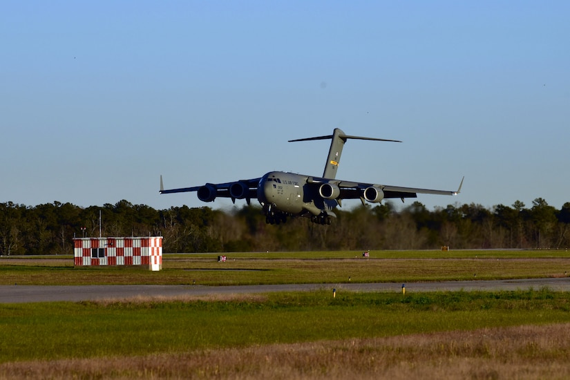 A C-17 Globemaster III assigned to Joint Base Charleston prepares to land at McEntire Joint National Guard Base, S.C., Nov. 16, 2020. Palmetto Challenge is a global mobilization exercise held at McEntire Joint National Guard Base, S.C. The exercise is held in order to develop readiness and awareness in a simulated deployed environment for over 100 Airmen from Joint Base Charleston.