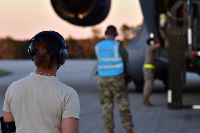 Airmen assigned to the 628th Air Base Wing begin to offload cargo from a C-17 Globemaster III at McEntire Joint National Guard Base, S.C., Nov. 16, 2020. Palmetto Challenge is a global mobilization exercise held at McEntire Joint National Guard Base, S.C. The exercise is held in order to develop readiness and awareness in a simulated deployed environment for over 100 Airmen from Joint Base Charleston.