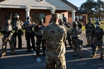 U.S. Air Force Col. Marc Greene, the 628th Air Base Wing commander, talked to Airmen about the importance of maintaining full-spectrum readiness and training at McEntire Joint National Guard Base, S.C., Nov. 16, 2020. Palmetto Challenge is a global mobilization exercise held at McEntire Joint National Guard Base, S.C., and Pope Army Airfield, N.C. The exercise is held in order to develop readiness and awareness in a simulated deployed environment for over 100 Airmen from Joint Base Charleston.