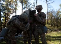 Defenders assigned to the 628th Security Forces Squadron conduct training on a Mobile Anti-Drone Systems Kit (MADS-K) at McEntire Joint National Guard Base, S.C., Nov. 16, 2020. Palmetto Challenge is a global mobilization exercise held at McEntire Joint National Guard Base, S.C., and Pope Army Airfield, N.C. The exercise is held in order to develop readiness and awareness in a simulated deployed environment for over 100 Airmen from Joint Base Charleston.