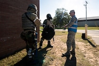 Airmen assigned to the 628th Air Base Wing conduct Post-attack Reconnaissance Team sweeps after a simulated air attack, at McEntire Joint National Guard Base, S.C., Nov. 16, 2020. Palmetto Challenge is a global mobilization exercise held at McEntire Joint National Guard Base, S.C., and Pope Army Airfield, N.C. The exercise is held in order to develop readiness and awareness in a simulated deployed environment for over 100 Airmen from Joint Base Charleston.