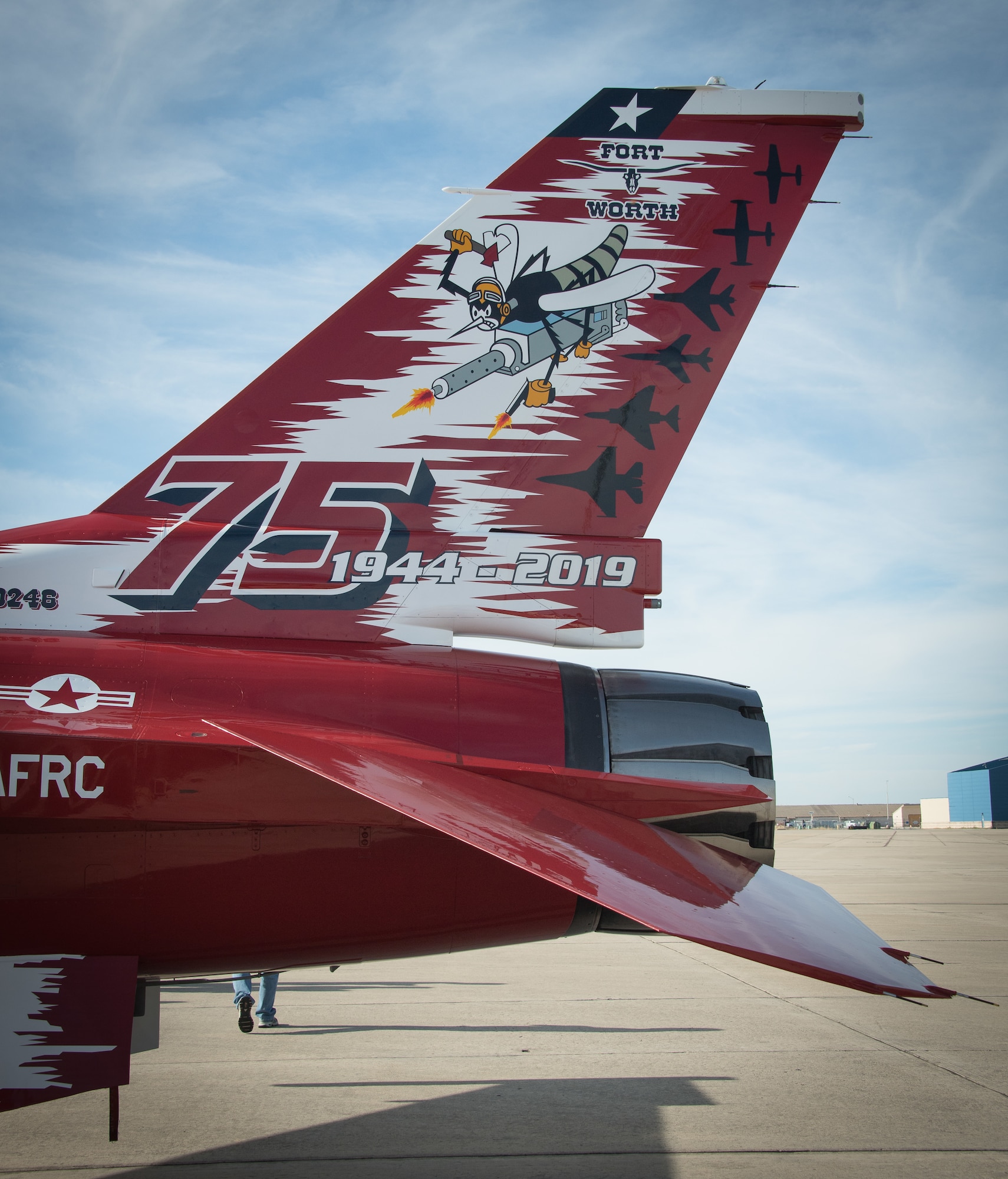 The 75th anniversary tail art commemorating the years and dedication of the men and women of the 301st Fighter Wing. This F-16 arrived fully dressed to U.S. Naval Air Station Joint Reserve Base Fort Worth, Texas on November 4, 2020. (U.S. Air Force photo by Jeremy Roman)