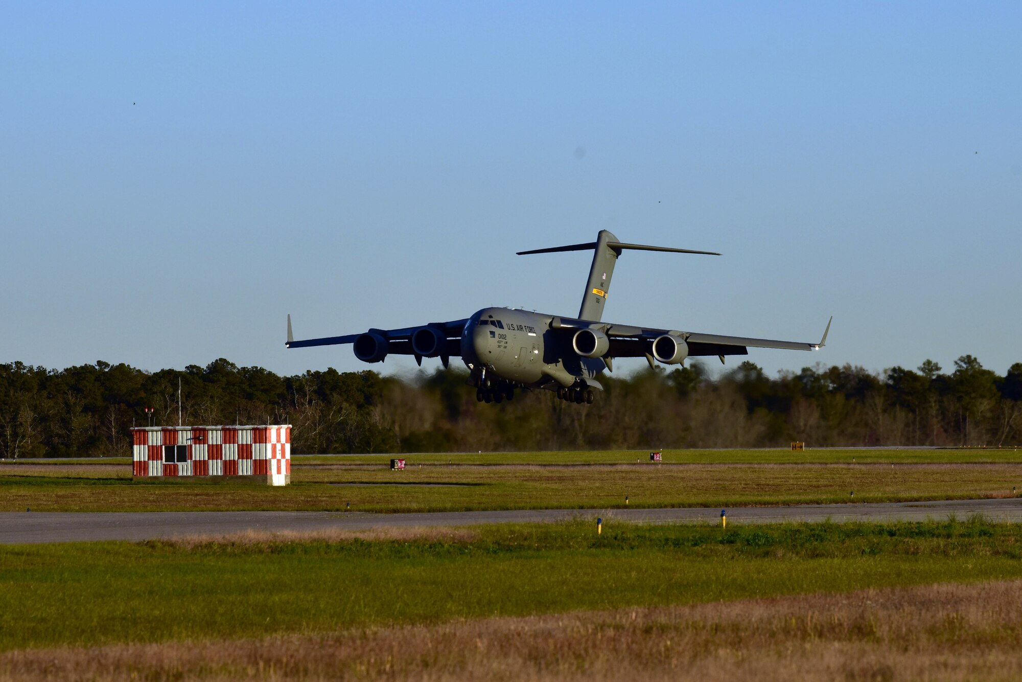 A C-17 Globemaster III assigned to Joint Base Charleston prepares to land at McEntire Joint National Guard Base, S.C., Nov. 16, 2020. Palmetto Challenge is a global mobilization exercise held at McEntire Joint National Guard Base, S.C., and Pope Army Airfield, N.C. The exercise is held in order to develop readiness and awareness in a simulated deployed environment for over 100 Airmen from Joint Base Charleston.