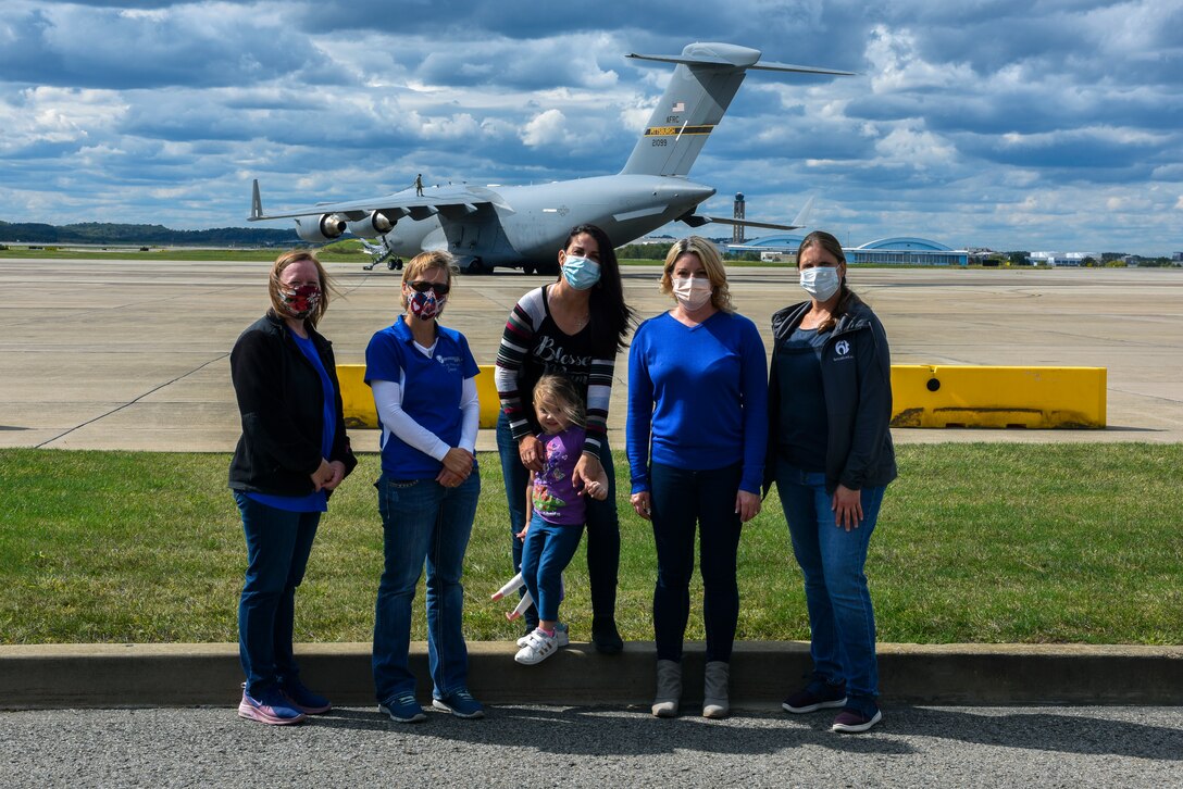 Members of the 911th Airlift Wing Key Spouse Group pose for a photo during a base tour at the Pittsburgh International Airport Air Reserve Station, Pennsylvania, Oct. 4, 2020.