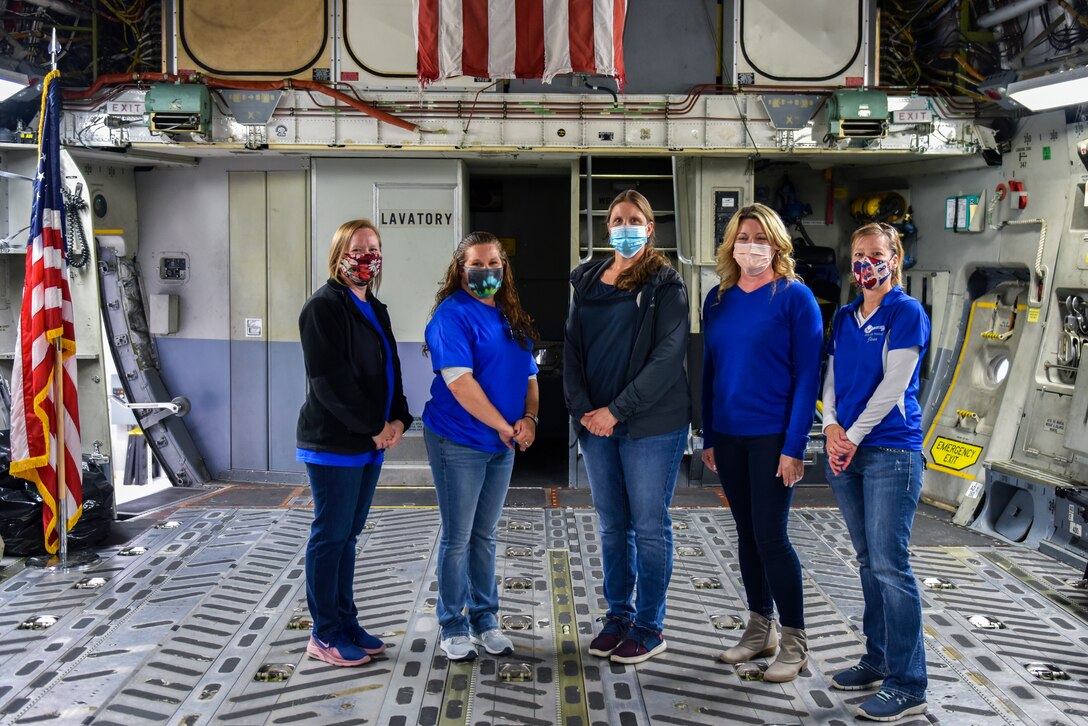 Members of the 911th Airlift Wing Key Spouse Group pose for a photo during a base tour at the Pittsburgh International Airport Air Reserve Station, Pennsylvania, Oct. 4, 2020.