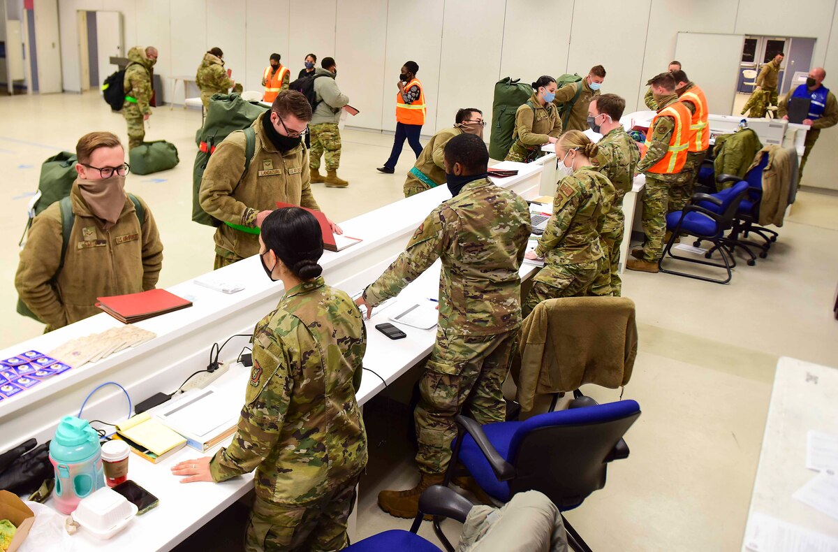 Airmen assigned to the 354th Fighter Wing participate in a mock deployment line during Arctic Gold 21-1 on Eielson Air Force Base, Alaska, Nov. 18, 2020. Representatives from many squadrons simulated a deployment line personnel to create a realistic training environment. (U.S. Air Force photo by Senior Airman Keith Holcomb)