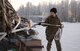 An Airman assigned to the 354th Logistics Readiness Squadron prepares cargo for transport during Arctic Gold 21-1 on Eielson Air Force Base, Alaska, Nov. 18, 2020. Thousands of pounds of equipment and hundreds of Airmen were ready to deploy alongside 12 F-35 Lightning II at a moment's notice. (U.S. Air Force photo by Senior Airman Beaux Hebert)