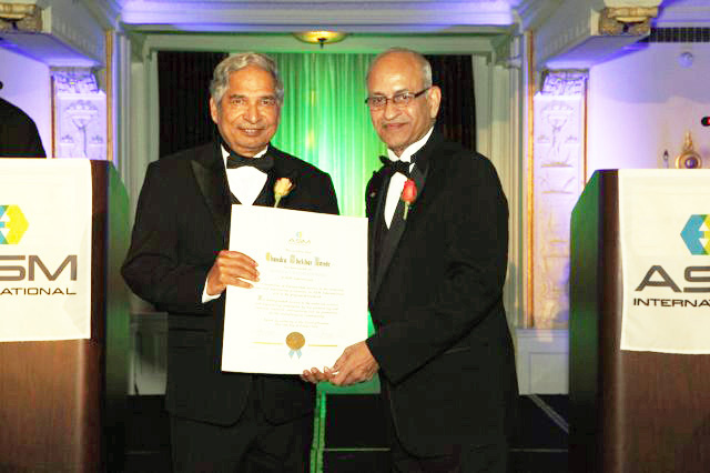 Professor C. Ravi Ravindran (right), president of ASM International, recognizes NRL's Dr. Chandra Pande with ASM Honorary Membership for his work in materials science. 
(Photo: U.S. Naval Research Laboratory) RELEASED