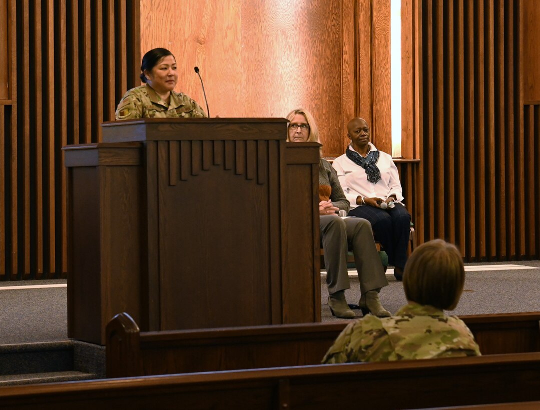 Woman speaking at podium