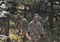 Soldiers hike to the top of Hill 303 as part of the third annual Nakdong Challenge, held Nov. 5 at the U.S. Army Medical Materiel Center-Korea. The challenge tests the Soldier’s skills while honoring those who fought and died in the Korean War.