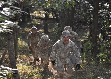 Soldiers hike to the top of Hill 303 as part of the third annual Nakdong Challenge, held Nov. 5 at the U.S. Army Medical Materiel Center-Korea. The challenge tests the Soldier’s skills while honoring those who fought and died in the Korean War.