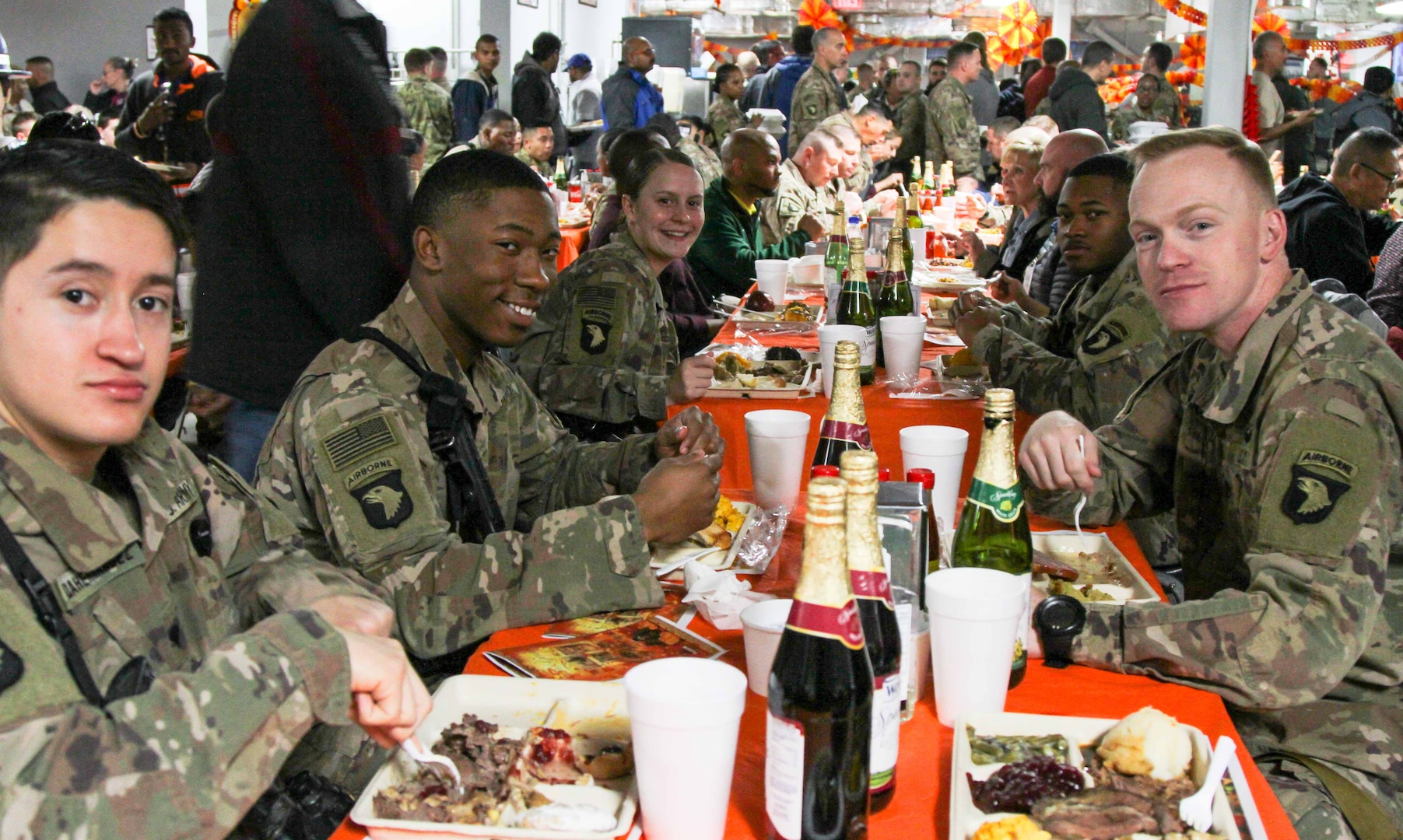 A group of soldiers celebrate Thanksgiving dinner in a photo from 2018.