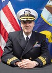 Studio portrait of Cmdr. Kurt C. Astroth.