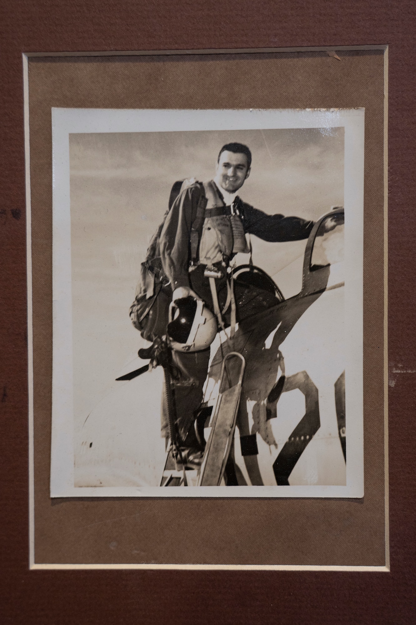 A photo of 1st Lt. Robert P. Gaudé, Jr., 430th Fighter Bomber Squadron pilot, is displayed inside Gaudé Lanes Bowling Center at Keesler Air Force Base, Mississippi, Nov. 13, 2020. The bowling center was dedicated to Gaudé, who was killed in action during the Korean War on July 10, 1953. (U.S. Air Force photo by Airman 1st Class Kimberly L. Mueller)