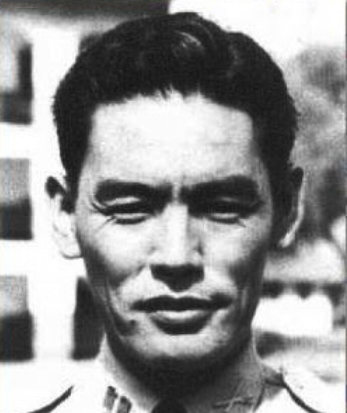A man looks directly into the camera.