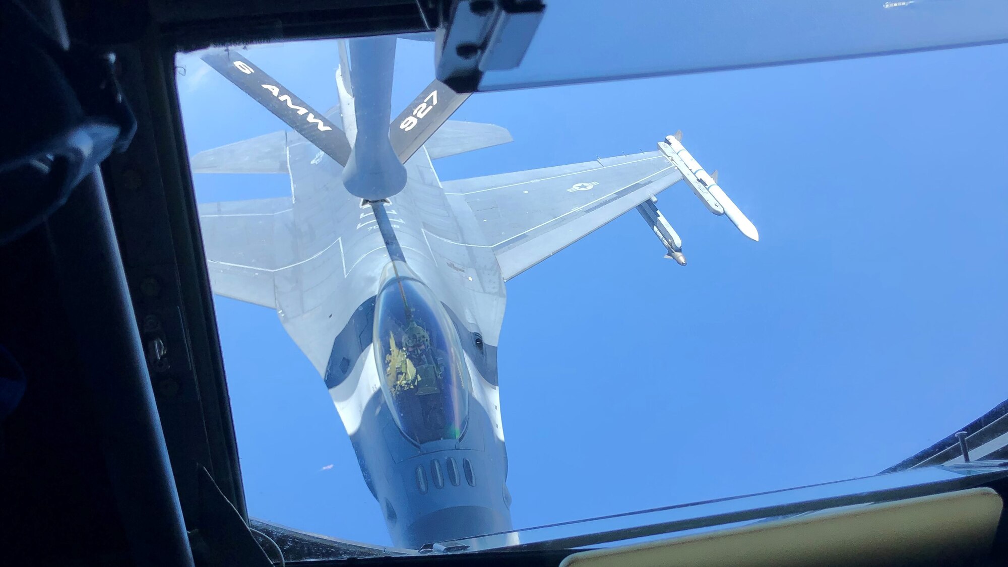 An F-16 Fighting Falcon aircraft assigned to Homestead Air Reserve Base, Fla., conducts aerial refueling training with a KC-135 Stratotanker aircraft from the 6th Air Refueling Wing, MacDill Air Force Base, Fla. Apr. 15, 2019 over the Atlantic Ocean.