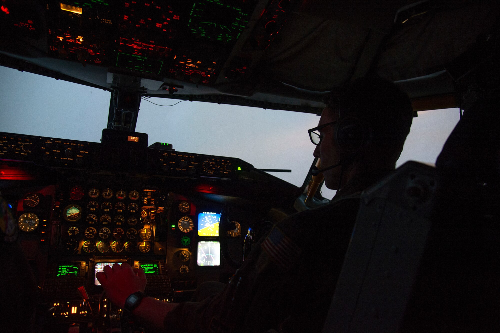 U.S. Air Force Capt. Richard Hall, a pilot assigned to the 91st Air Refueling Squadron, operates the controls of a KC-135 Stratotanker, during a training mission, Sept. 30, 2020, at MacDill Air Force Base, Fla.