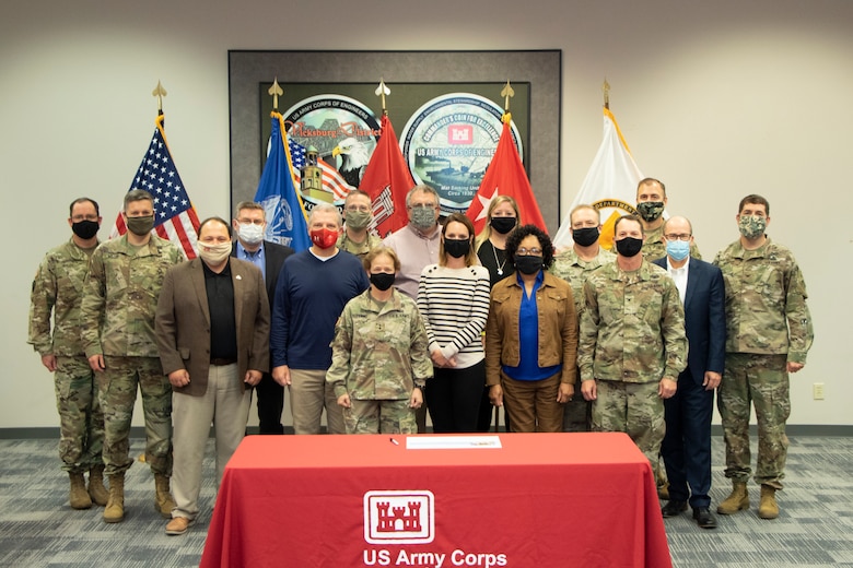 The U.S. Army Corps of Engineers, Mississippi Valley Division leaders participate in the annual major subordinate command (MSC) Regional Governance Boards known as R5. (L to R: Col. Karl Jansen, St. Paul District (MVP) Commander; Col. Zachary Miller, Memphis District (MVM) Commander; Donny Davidson, Deputy District Engineer for Programs and Project Management (DDE/DPM); Kevin Wilson, MVP DDE; Eddie Belk, MVD Director of Programs; Col. Steven Sattinger, Rock Island District Commander; Maj. Gen. Diana Holland, MVD Commanding General; Jim Bodron, MVD Director of Business Directorate; Susan Wilson, St. Louis District (MVS DPM); Kim Thomas, MVR DDE; Patricia Hemphill, Vicksburg District (MVK) DDE; Lt. Col. Thomas Sears, MVS DDE; Col. Hilliard, MVK Commander;  Col. Jeremy Chapman, MVD Deputy Commander; Mark Wingate, New Orleans District (MVN) DDE; Col. Stephen Murphy, MVN Commander)