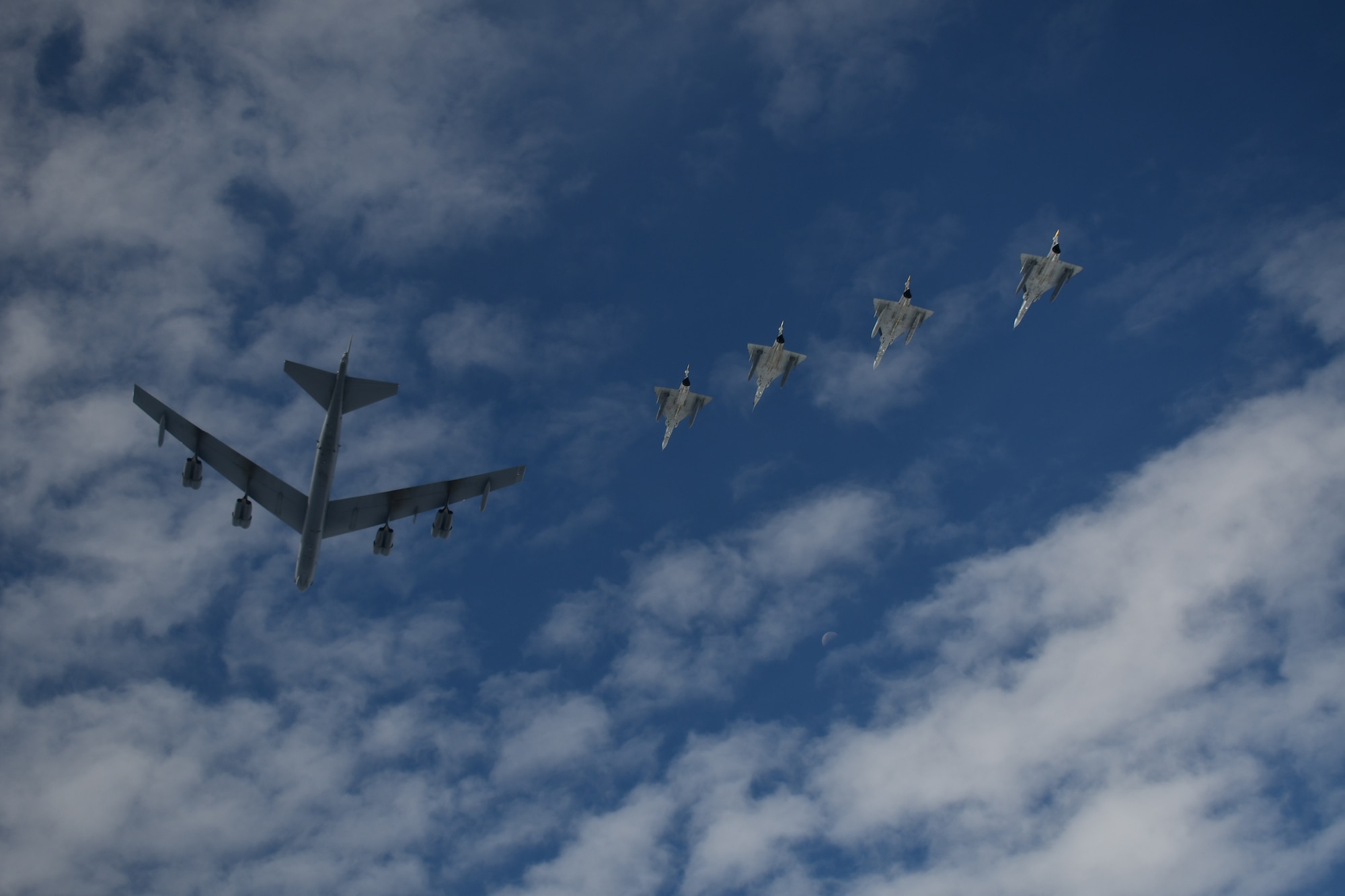 U.S. aircraft and Colombian aircraft flying in formation