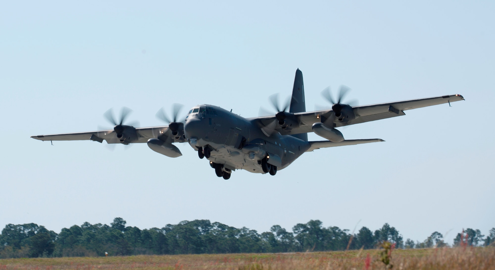 Large military aircraft coming in for a landing