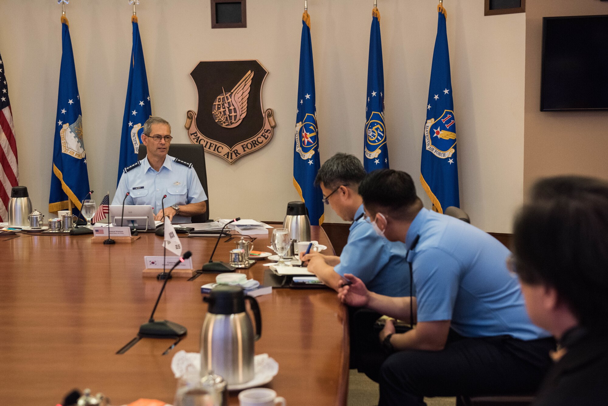 U.S. Air Force Gen. Ken Wilsbach, Pacific Air Forces (PACAF) commander, begins a round table discussion during an engagement at PACAF Headquarters on Joint Base Pearl Harbor-Hickam, Hawaii, Nov. 20, 2020. During the engagement, Air Chiefs from the Japan Air Self-Defense Force, Republic of Korea Air Force and Royal Australian Air Force were present to discuss operational priorities and common security interests between the countries. (U.S. Air Force photo by Staff Sgt. Hailey Haux)