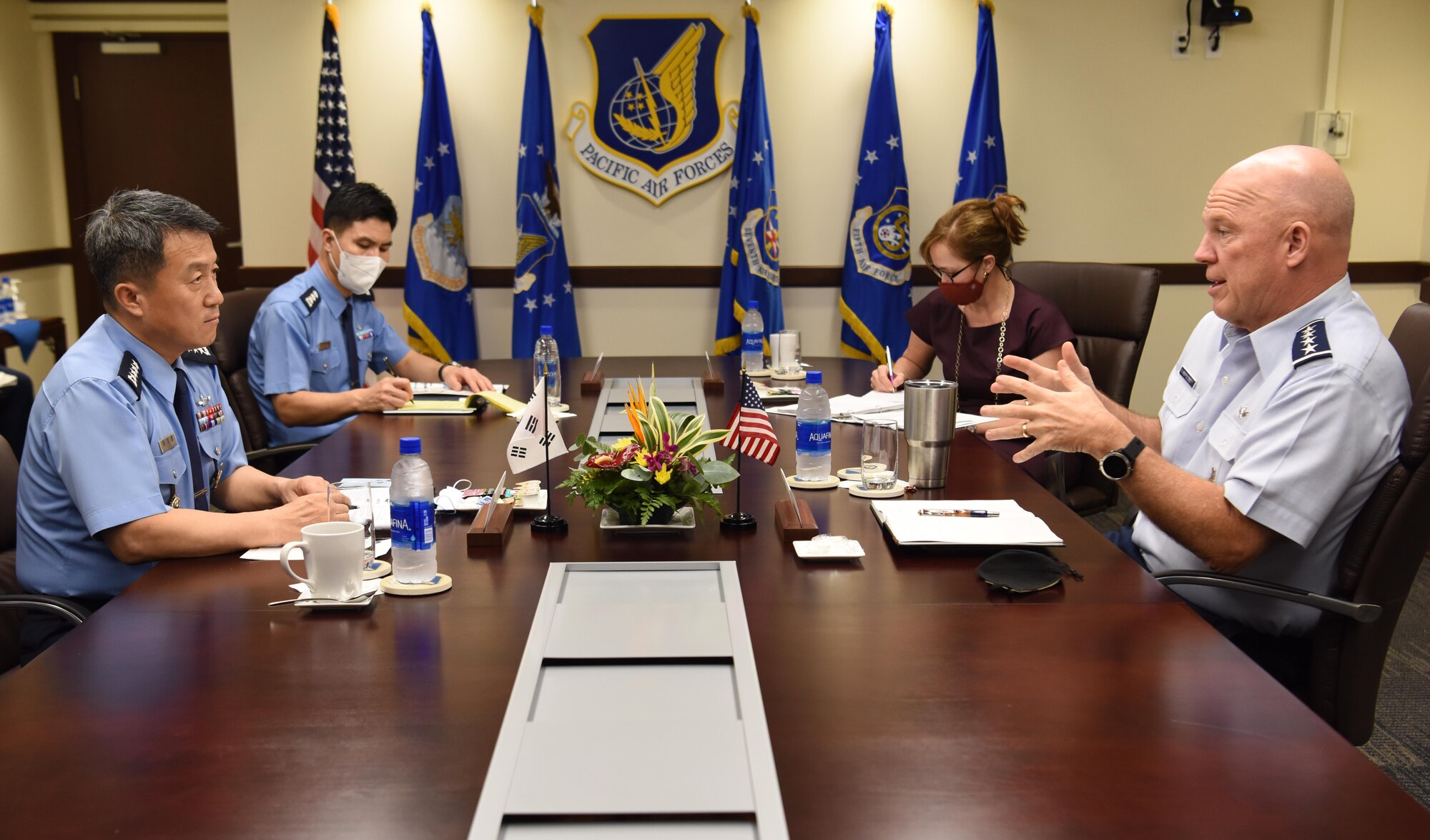 U.S. Space Force Gen. John W. “Jay” Raymond, right, Chief of Space Operations, talks with Gen. Lee Seong Yong, Chief of Staff Republic of Korea Air Force (ROKAF), during a bilateral engagement on Joint Base Pearl Harbor-Hickam, Hawaii, Nov. 19, 2020. During the discussion, Raymond spoke on the foundational direction for the Space Force and the importance of interoperability with allies and partners. (U.S. Air Force photo by Tech. Sgt. Zach Vaughn)