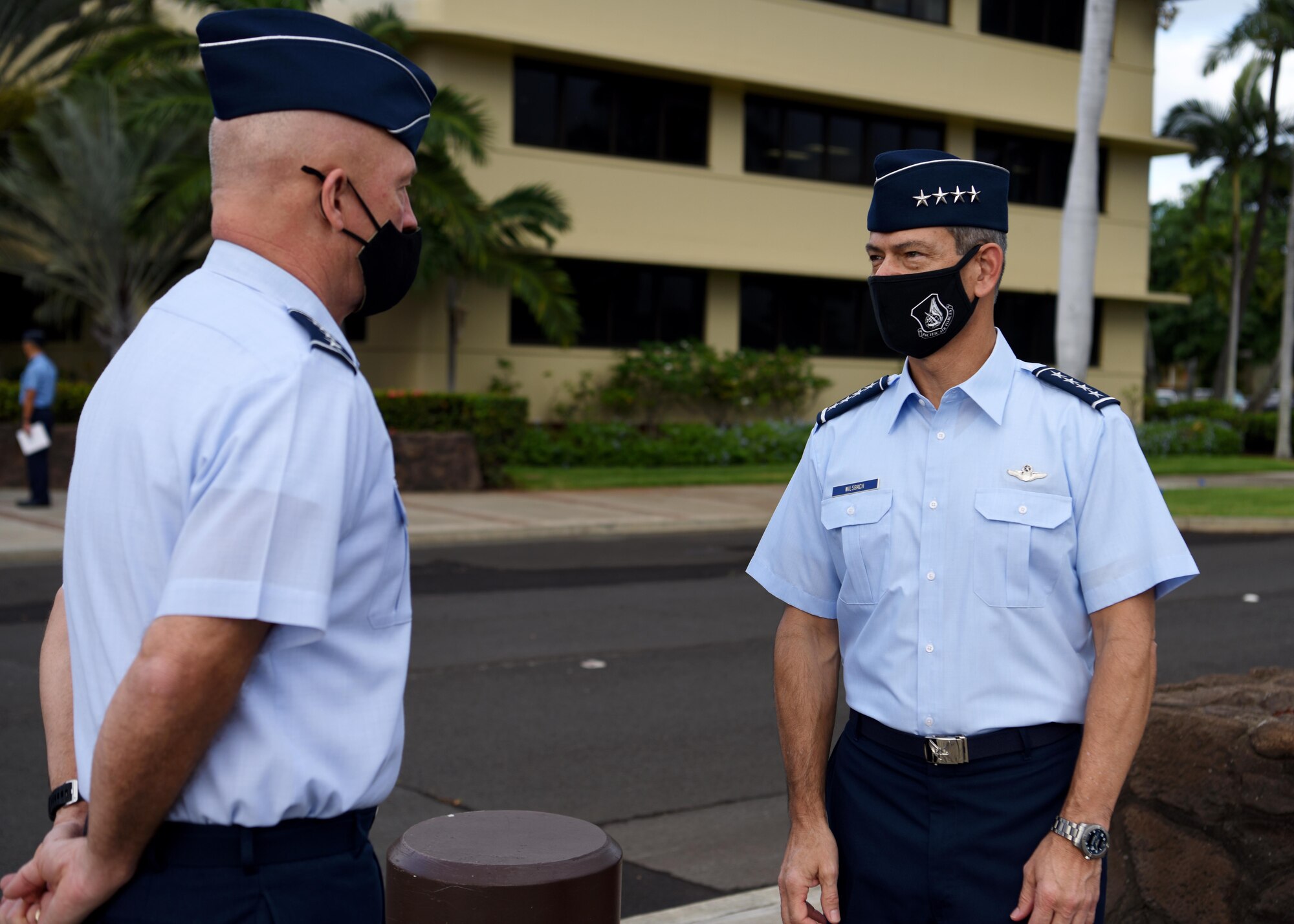 U.S. Space Force Gen. John W. “Jay” Raymond, left, Chief of Space Operations, speaks to U.S. Air Force Gen. Ken Wilsbach, Pacific Air Forces commander, during his first official visit to Pacific Air Forces Headquarters at Joint Base Pearl Harbor-Hickam, Hawaii, Nov. 19, 2020. The visit allowed Raymond to discuss the Space Force’s foundational direction and the importance of interoperability with allies and partners in the Indo-Pacific region. (U.S. Air Force photo by Tech. Sgt. Zach Vaughn)