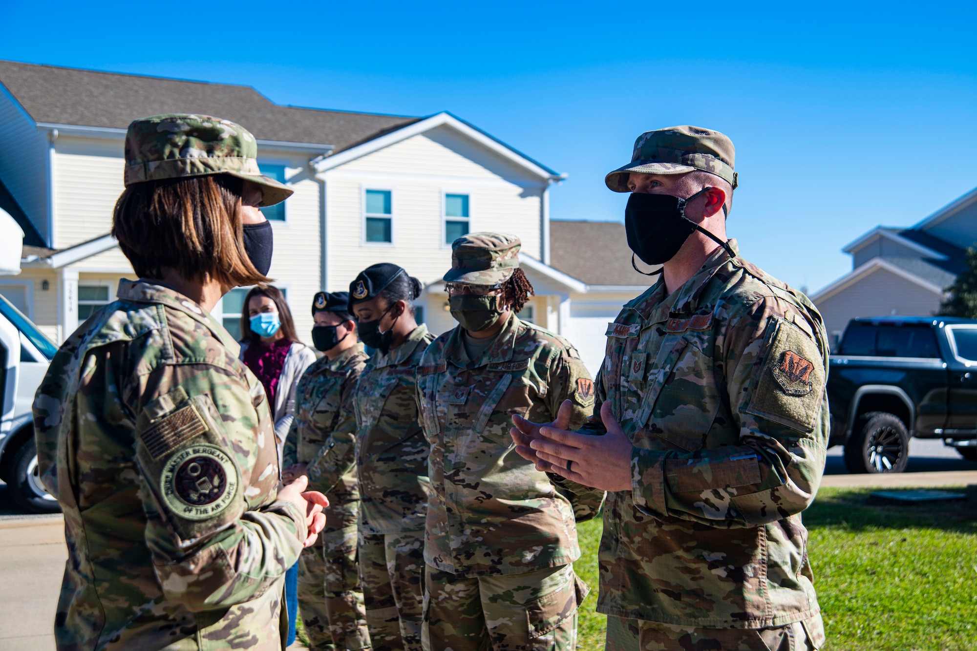 A photo of Airmen having a conversation.