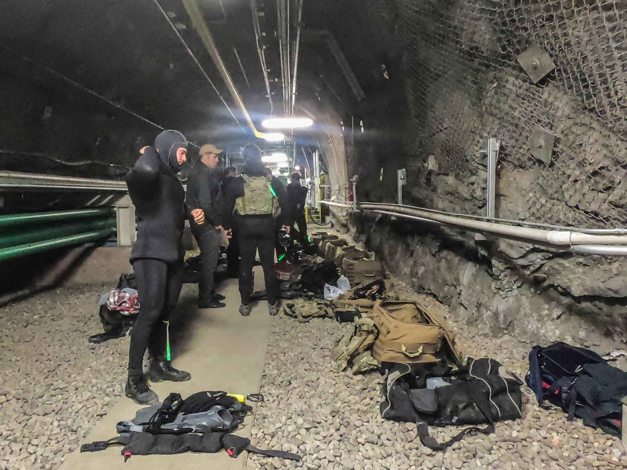 SFOD (A) members prepare to dive into a water reservoir inside Cheyenne Mountain
