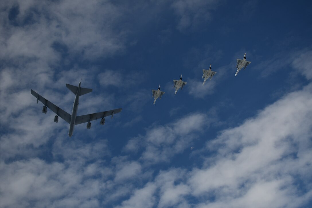 U.S. aircraft and Colombian aircraft flying in formation