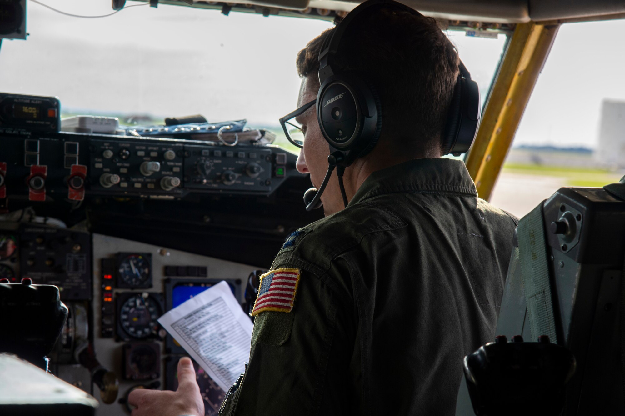 U.S. Air Force Capt. Richard Hall, a pilot assigned to the 91st Air Refueling Squadron, reviews a checklist prior to takeoff from MacDill Air Force Base, Fla., Sept. 30, 2020.