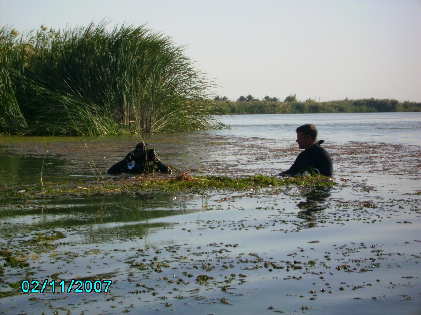 Jon Larrew conducting a search in a river in the Middle East.