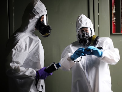 Survey team members from the 10th Civil Support Team conduct a hazardous material detection exercise with the Port of Seattle Fire Department with Washington State Department of Health observers at the Seattle Tacoma International Airport on Nov. 18, 2020. The 10th Civil Support Teams trains for a number of different scenarios alongside civilian first responders.