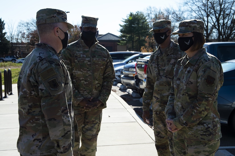 U.S. Air Force Col Tyler Schaff and Chief Master Sgt. Ezekiel Ross, 316th Wing Commander and Command Chief, welcome Chief Master Sgt. of the Air Force JoAnne Bass, and Chief Master Sgt. Nathaniel Perry, Air Force First Sgt. Special Duty Manager, at Joint Base Andrews, Md., Nov. 23, 2020. Bass and her team attended the 316th Operations Group’s immersion tour. (U.S. Air Force Photo by Senior Airman Kaylea Berry)