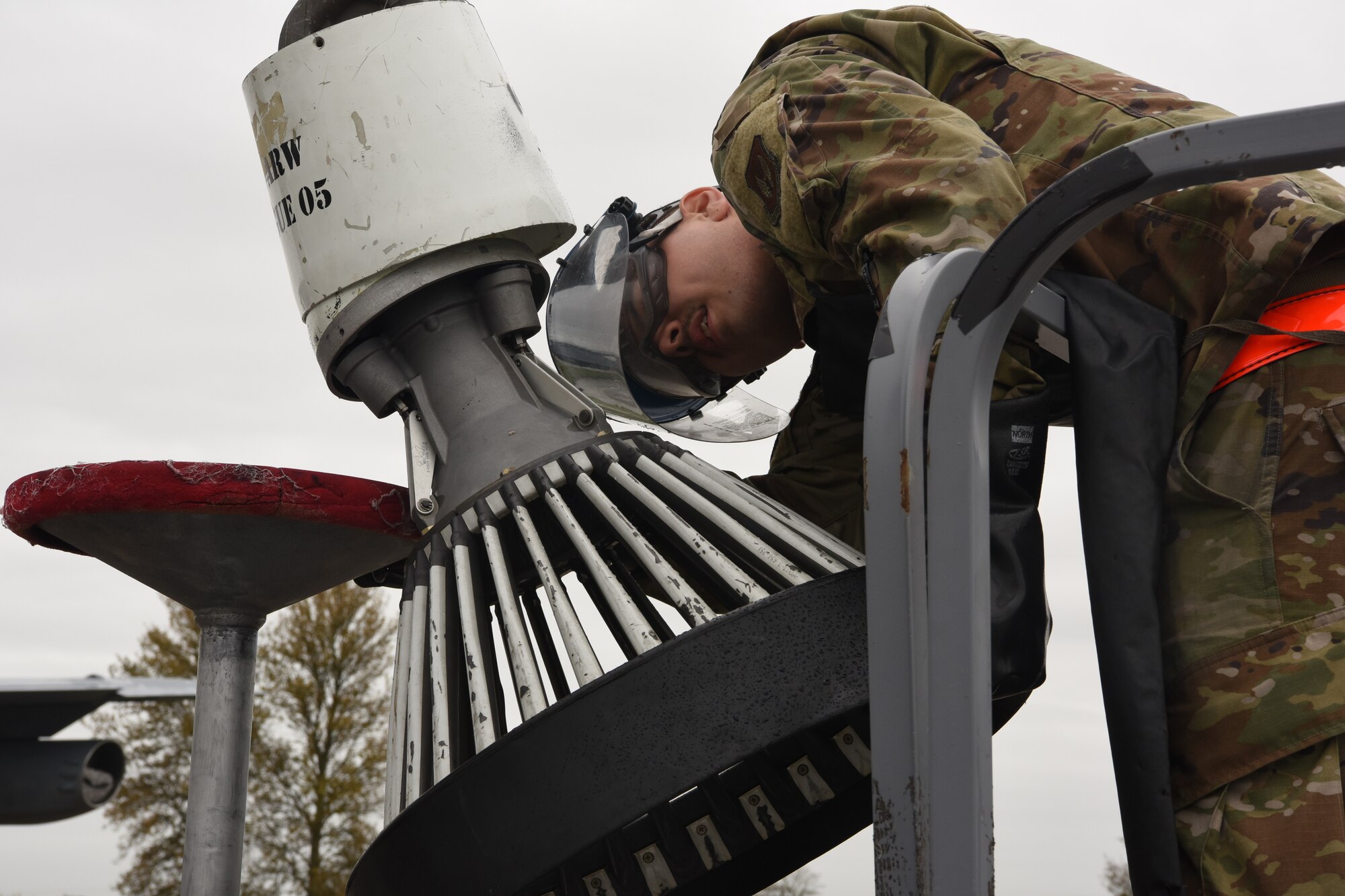 U.S. Air Force Airman 1st Class Julian Nailing, 100th Aircraft Maintenance Squadron crew chief, inspects the bolts on the drogue of a KC-135 Stratotanker aircraft at Royal Air Force Mildenhall, England, Oct. 29, 2020. The drogue’s ability to function and deliver fuel is ensured by thorough maintenance. (U.S. Air Force photo by Airman 1st Class David Busby)