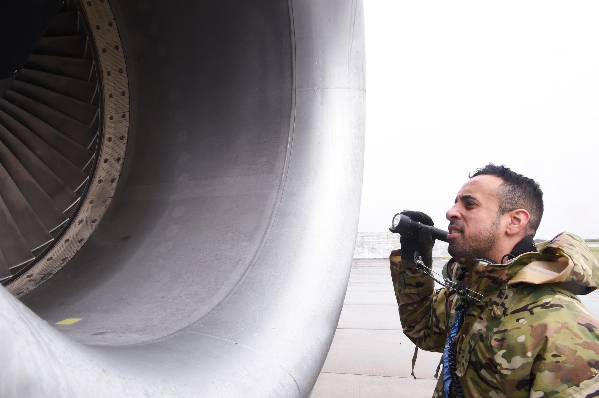 U.S. Air Force Tech. Sgt. Elliot Rivera, 100th Aircraft Maintenance Squadron propulsion craftsman, inspects the inner engine of a KC-135 Stratotanker aircraft at Royal Air Force Mildenhall, England, Oct. 29, 2020. The 100th Maintenance Group ensures the Bloody Hundredth’s KC-135 Stratotanker aircraft are able to provide rapid global mobility and aerial refueling capability to the U.S. Air Force and NATO partners and allies, 24 hours a day, 365 days a year. (U.S. Air Force photo by Airman 1st Class David Busby)