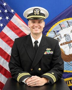 Studio portrait of  Lt. Cmdr. Erik M. Guiremand.