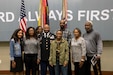 Maj. Paul Sheppard and his family take a group photo during his retirement ceremony at U.S. Army Central headquarters on Shaw Air Force Base, S.C., Nov. 12, 2020. Sheppard, a native of Newberry, South Carolina, retired from the military after serving 39 years. (U.S. Army photo by Pfc. Keon Horton)