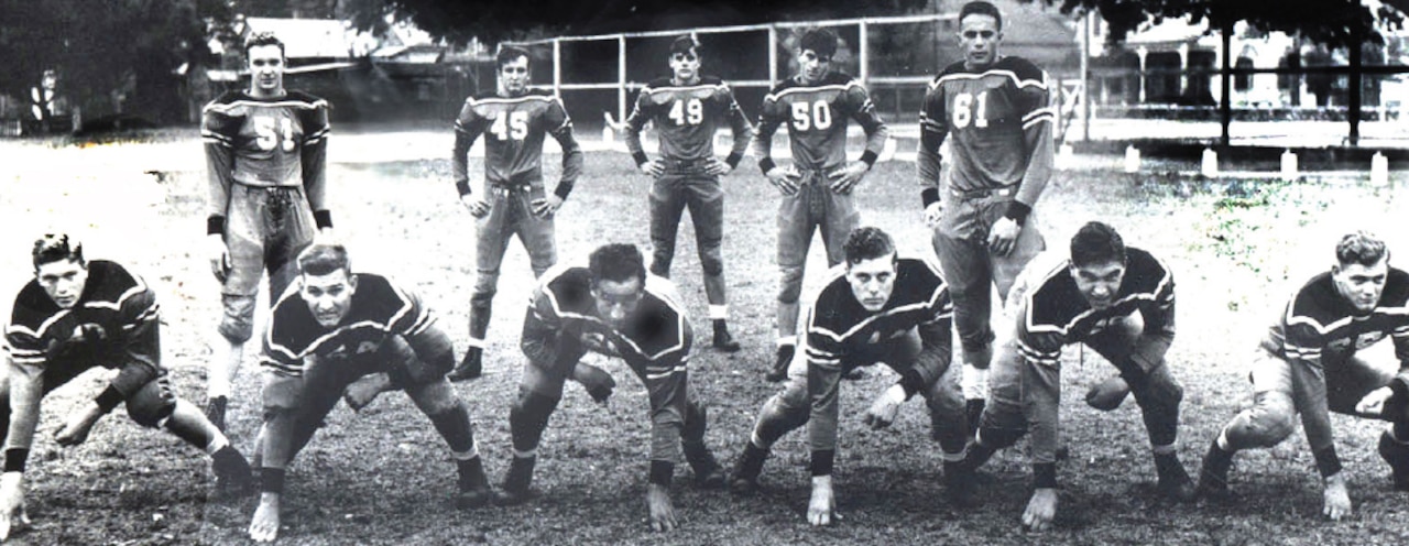 A football team poses for a photo.