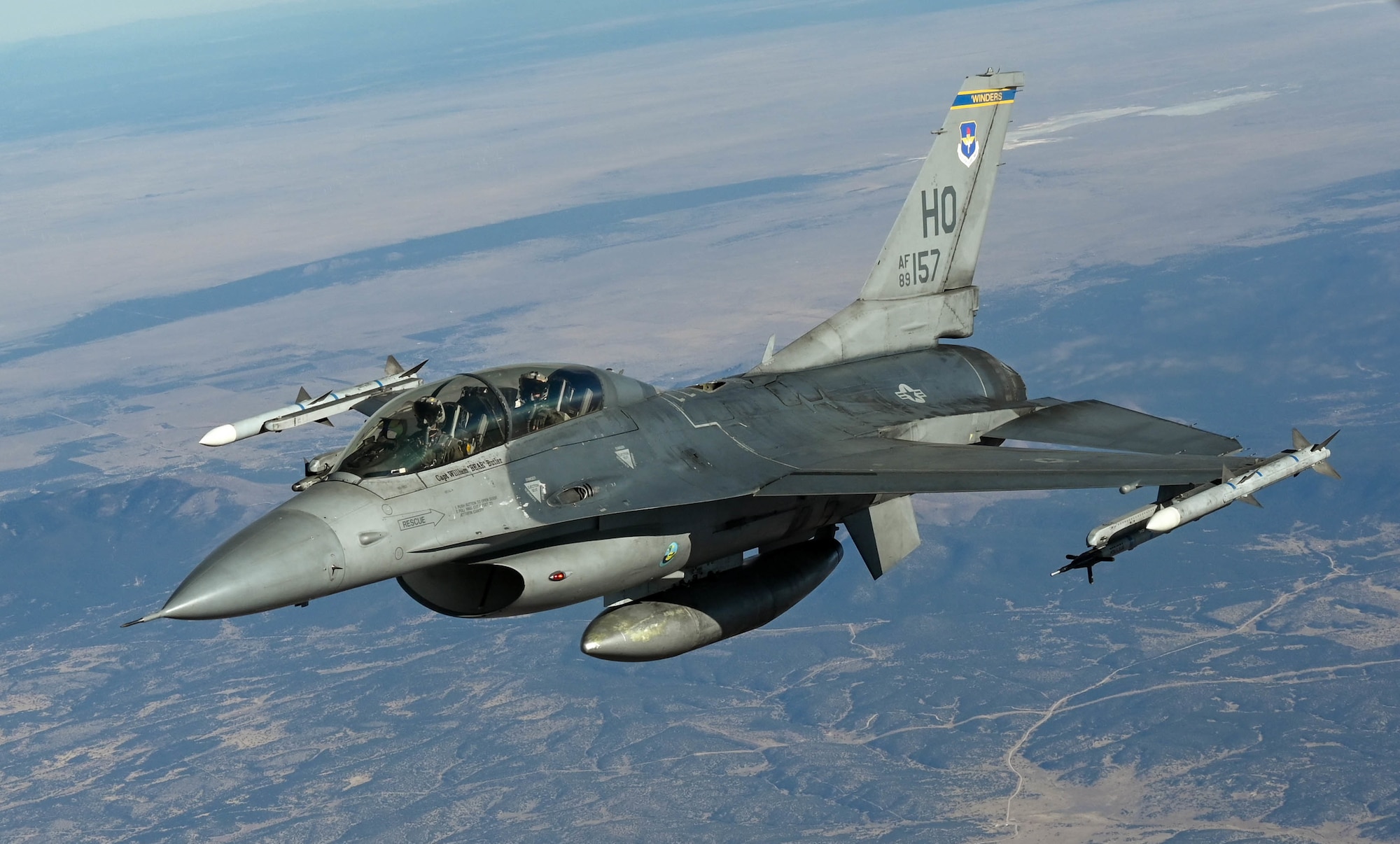 An F-16 Fighting Falcon from the 311th Fighter Squadron, flies above New Mexico during an aerial refueling training mission Nov. 20, 2020. (U.S. Air Force photo by Senior Airman Mary Begy)